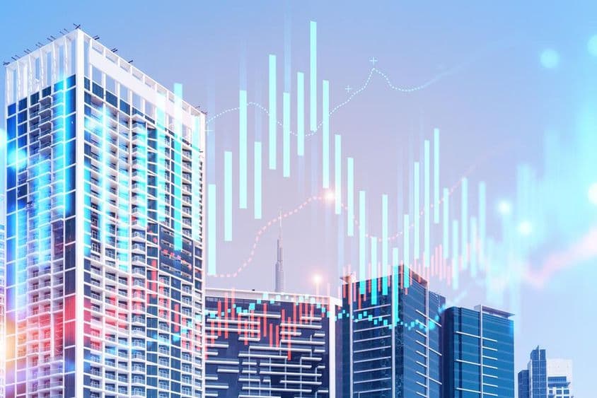 Prédios com o Burj Khalifa ao fundo e gráficos à frente.