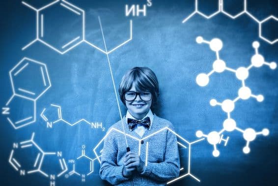 Um estudante é mostrado com uma projeção de ligação de átomos químicos.