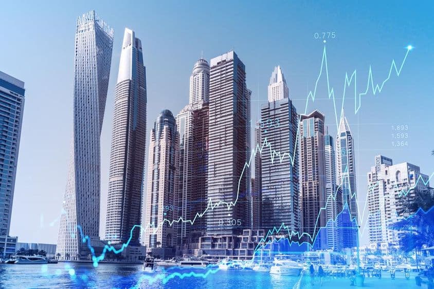 Centro empresarial de Dubai com sobreposição de gráfico forex.