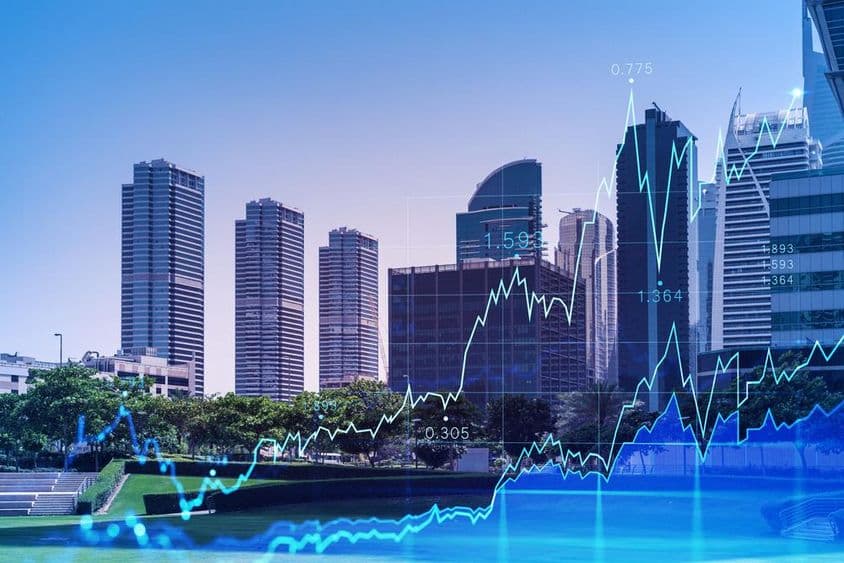 Horizonte de Dubai com gráfico de aumento de ações em primeiro plano.