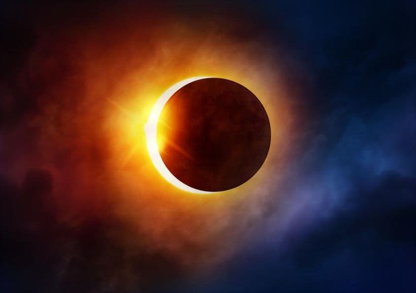 Eclipse solar enquanto a Lua se move em frente ao Sol.