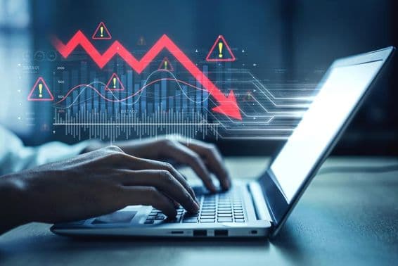 Gráfico de mercado, símbolos de alerta e tendências de dados negativos.
