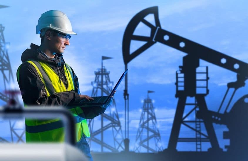 Homem controlando a produção de petróleo.
